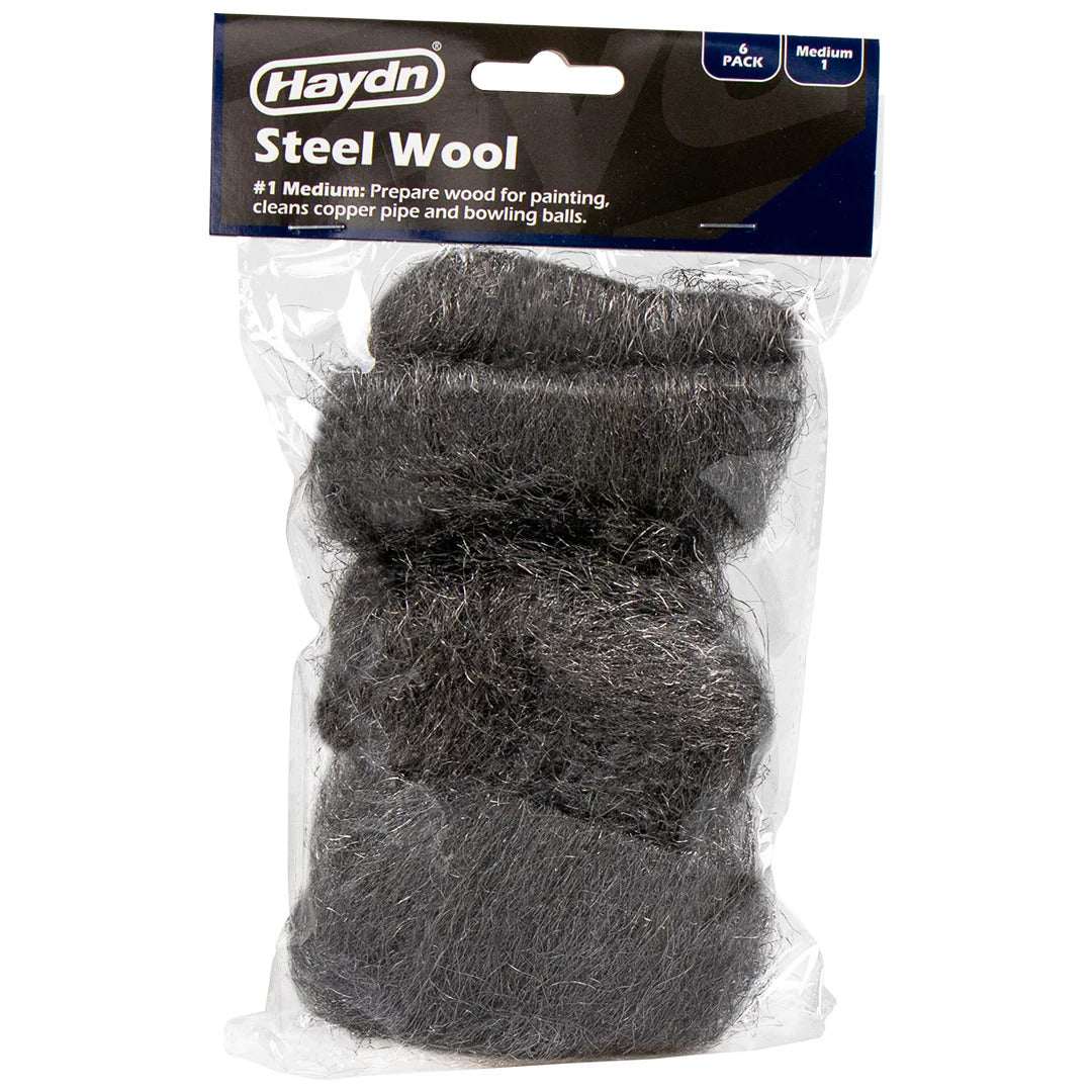 Haydn steel wool package with three pieces in clear plastic packaging on a white background