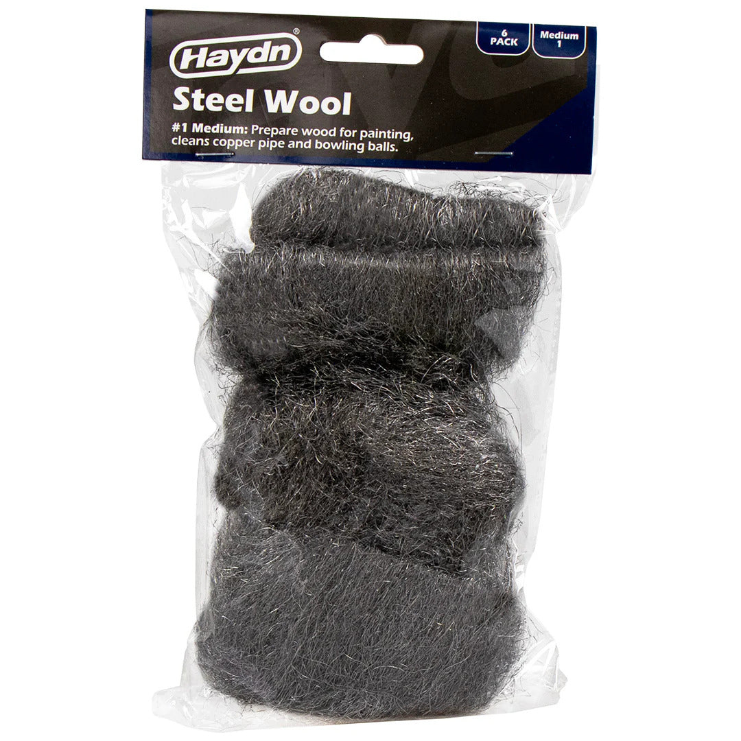 Haydn steel wool package with three pieces in clear plastic packaging on a white background