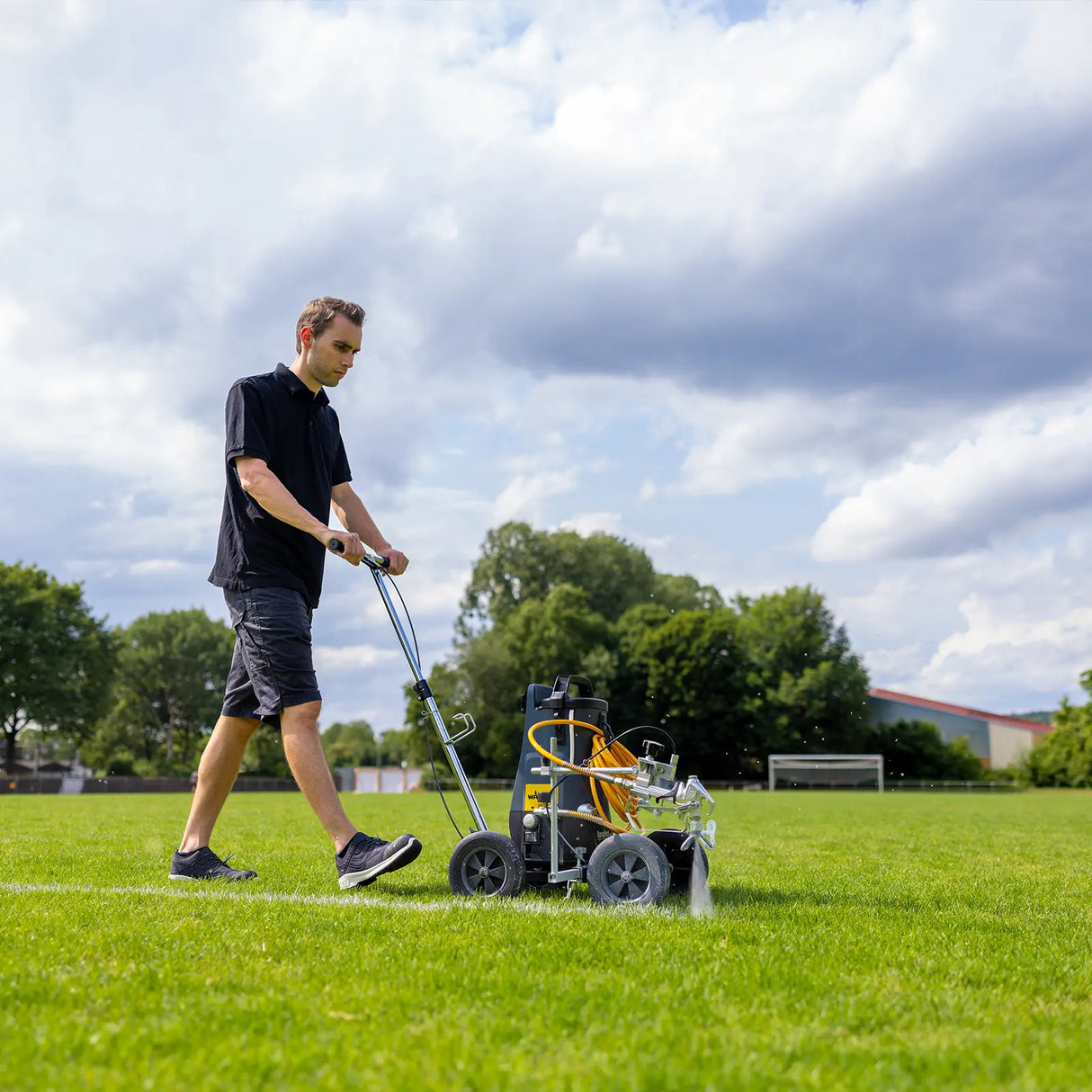 Wagner Line Cart in action with backpack sprayer