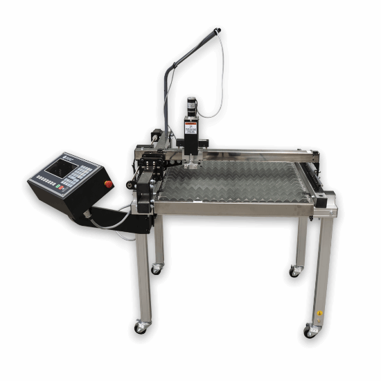 A stainless steel industrial table-top machine with a diamond-plate textured work surface, mounted arm, vertical tool head, and an attached black control console on a wheeled stand, shown on a plain white background.