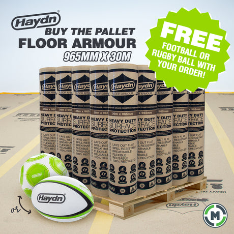 Haydn Heavy Duty Floor Armour rolls stacked on a wooden pallet with two green and white Haydn rugby balls in the foreground, plus promotional text and a green badge offering a free football or rugby ball with your order.
