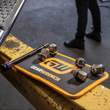 GearWrench tool set on a mat with a person in the background