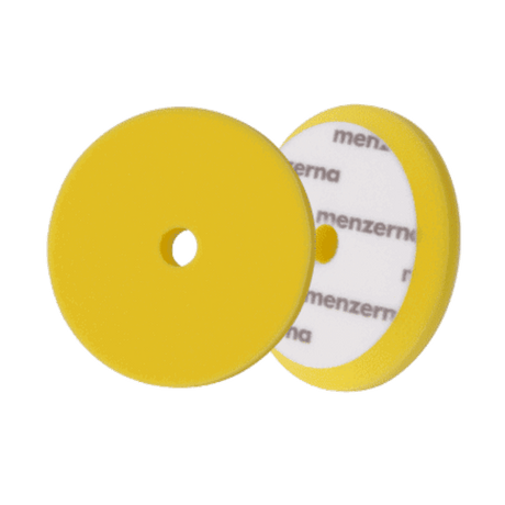 Yellow polishing pad with Menzerna branding 