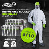 A person wearing a white hooded disposable coverall suit with green gloves and a hat, standing next to a stack of product packages.