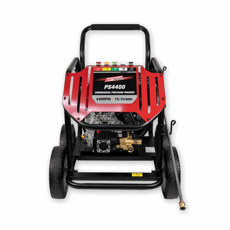 Red and black pressure washer with a hose on a white background