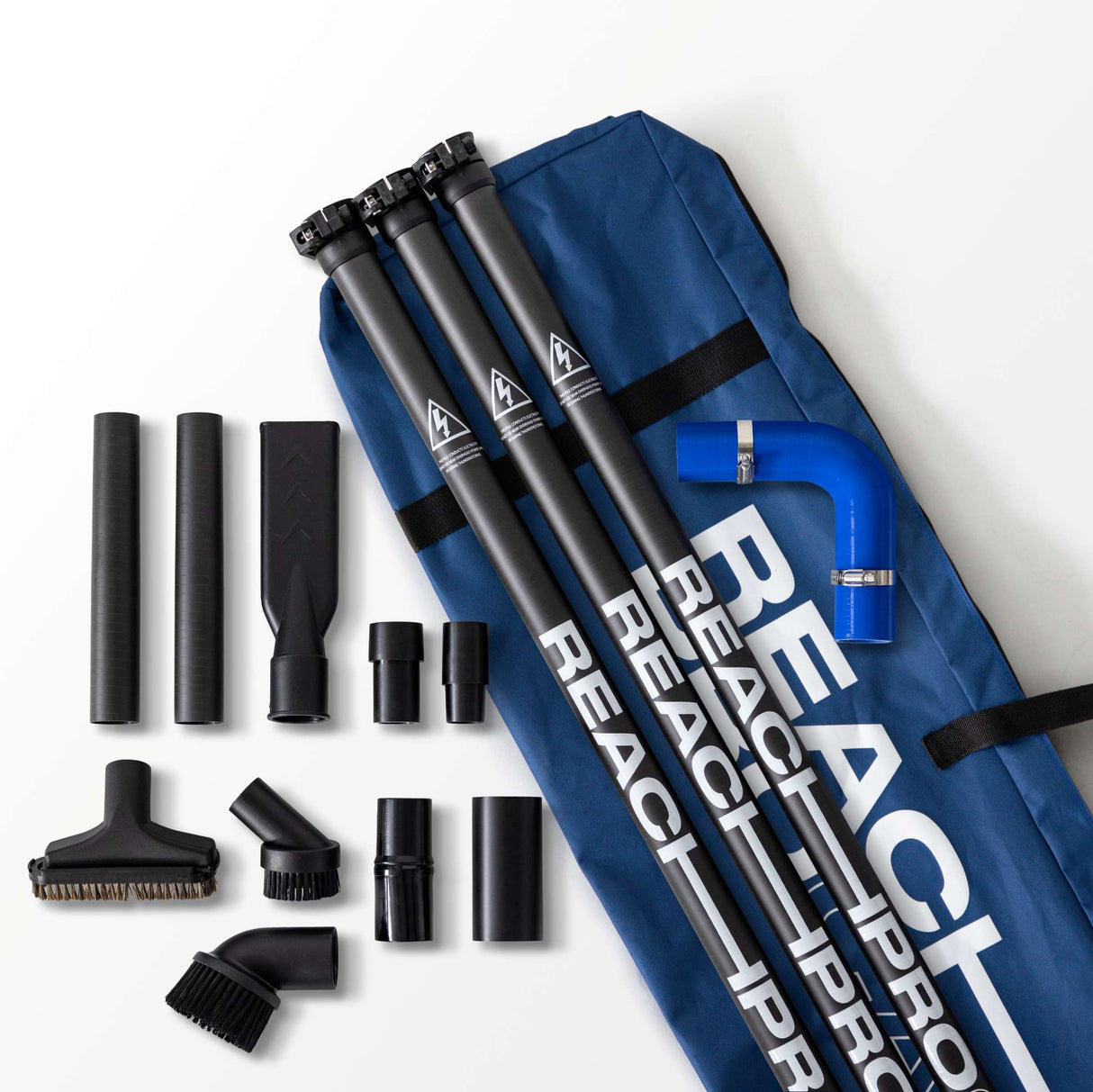 Reach Pro vacuum cleaner attachments and blue carrying case on a white background