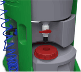 Close-up of a green and gray machine with red components on a white background