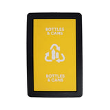 A recycling bin cover with a black outer frame and a bright yellow center panel featuring the text 'BOTTLES & CANS' and a white recycling symbol.