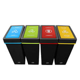 Four black plastic waste bins with colorful lids in blue, green, red, and yellow, arranged side by side on a white background.