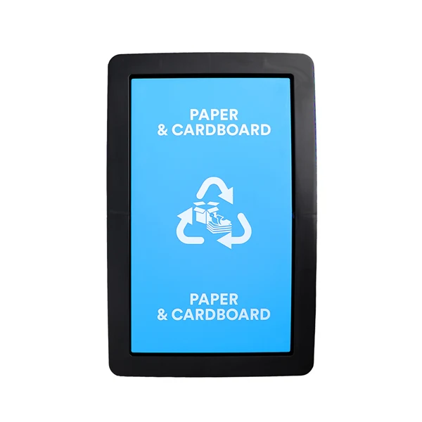 A black rectangular recycling bin sign or kiosk displaying a bright blue screen with white text reading 'PAPER & CARDBOARD' and a recycling symbol, centered on a white background.