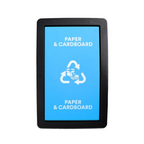 A black rectangular recycling bin sign or kiosk displaying a bright blue screen with white text reading 'PAPER & CARDBOARD' and a recycling symbol, centered on a white background.