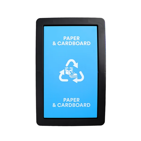 A black rectangular recycling bin sign or kiosk displaying a bright blue screen with white text reading 'PAPER & CARDBOARD' and a recycling symbol, centered on a white background.