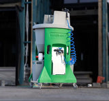 Washbox rocket cleaning machine with a coiled hose on a concrete floor.